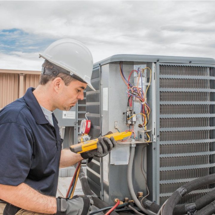 Stayner Heating & Cooling HVAC technician on a service call in Stayner, Ontario